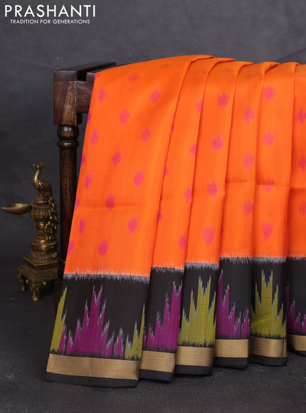 Ikat soft silk saree orange and black with allover ikat woven buttas and ikat woven zari woven border