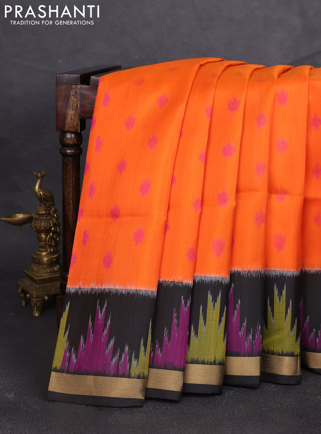 Ikat soft silk saree orange and black with allover ikat woven buttas and ikat woven zari woven border
