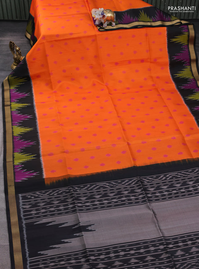 Ikat soft silk saree orange and black with allover ikat woven buttas and ikat woven zari woven border