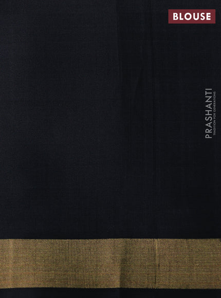 Ikat soft silk saree orange and black with allover ikat woven buttas and ikat woven zari woven border