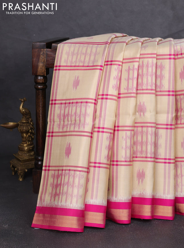 Ikat soft silk saree cream and pink with allover checks & ikat woven buttas and zari woven border