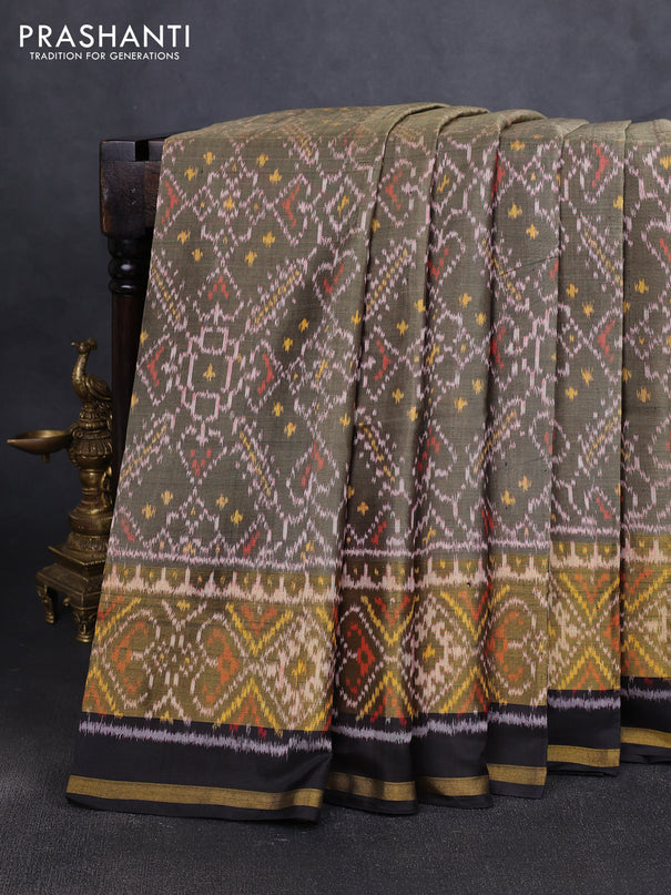 Rajkot patola silk saree elachi green and black with allover ikat weaves and zari woven border