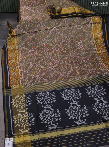 Rajkot patola silk saree elachi green and black with allover ikat weaves and zari woven border