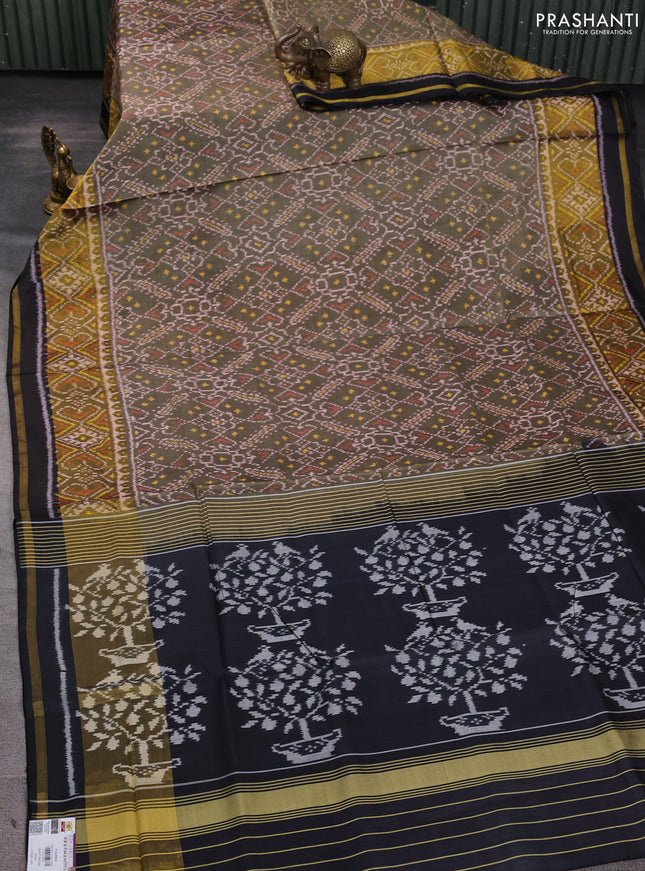 Rajkot patola silk saree elachi green and black with allover ikat weaves and zari woven border