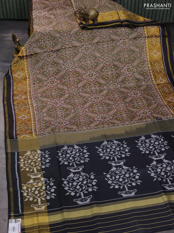 Rajkot patola silk saree elachi green and black with allover ikat weaves and zari woven border