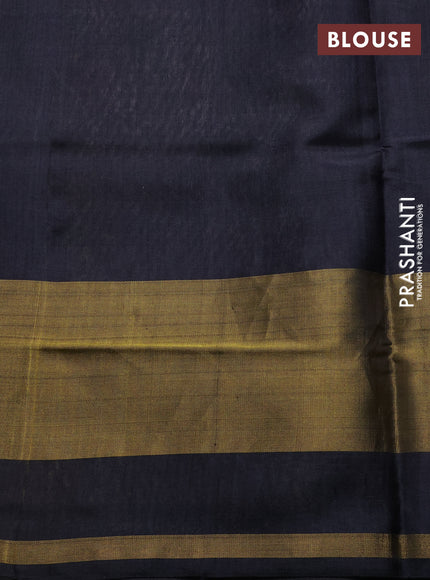 Rajkot patola silk saree elachi green and black with allover ikat weaves and zari woven border