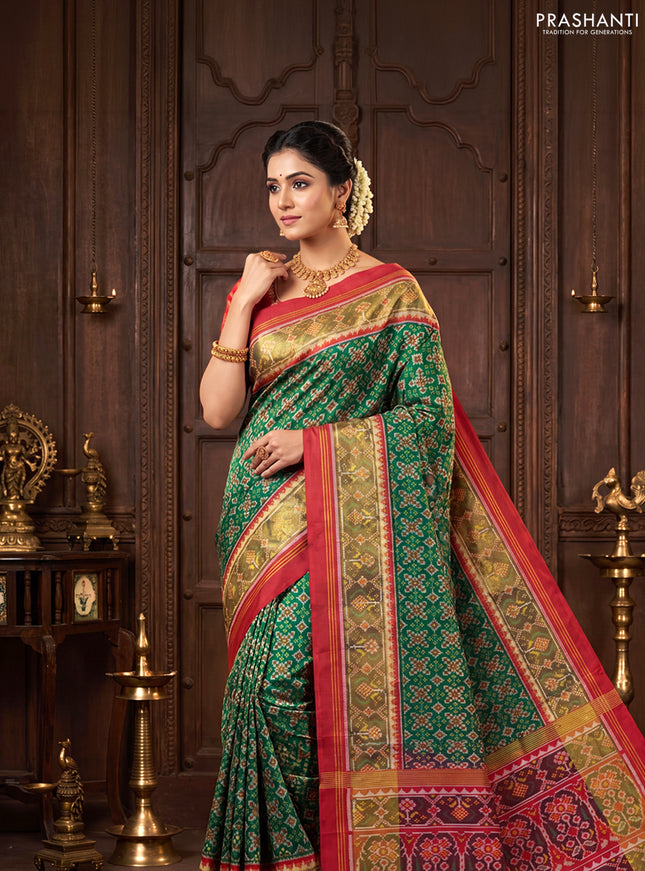 Rajkot patola silk saree green and maroon with allover ikat weaves and ikat zari woven border