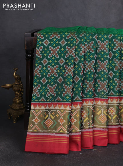 Rajkot patola silk saree green and maroon with allover ikat weaves and ikat zari woven border
