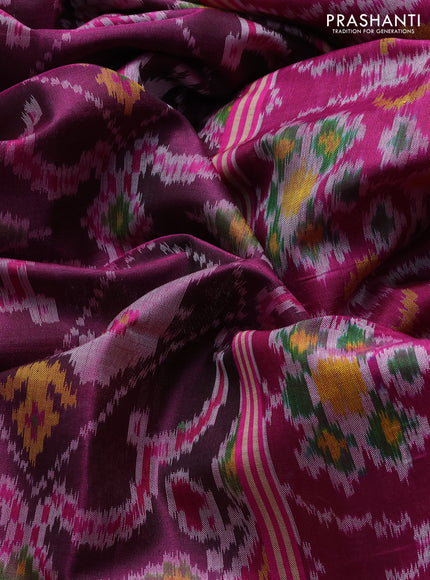 Rajkot patola silk saree magenta pink and blue with allover ikat weaves and ikat zari woven border