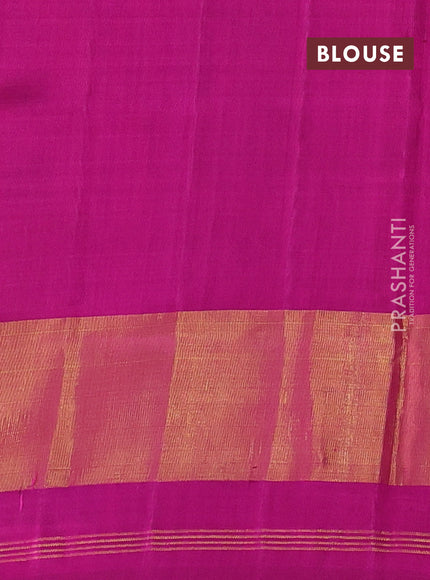Rajkot patola silk saree magenta pink and blue with allover ikat weaves and ikat zari woven border
