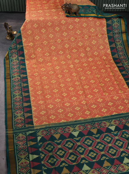 Rajkot patola silk saree sunset orange and bottle green with allover ikat woven buttas and ikat zari woven border