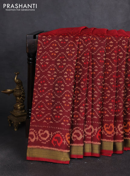 Rajkot patola silk saree deep maroon with allover ikat weaves and ikat zari woven border