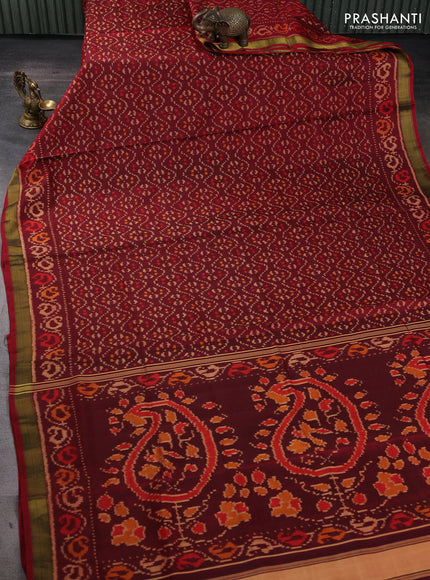 Rajkot patola silk saree deep maroon with allover ikat weaves and ikat zari woven border