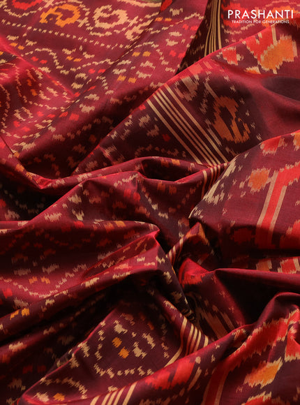 Rajkot patola silk saree deep maroon with allover ikat weaves and ikat zari woven border
