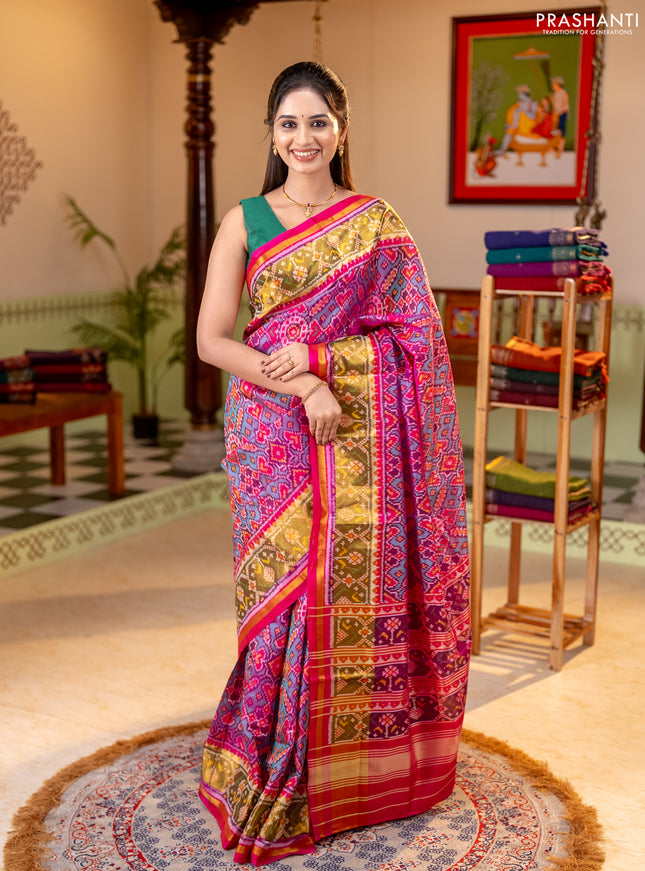 Rajkot patola silk saree dual shade of teal green and magenta pink with allover ikat weaves and ikat zari woven border
