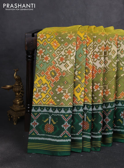 Rajkot patola silk saree mustard green and bottle green with allover ikat weaves and thread woven border