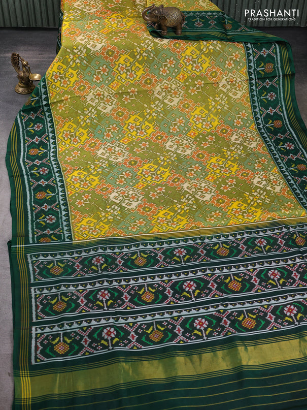 Rajkot patola silk saree mustard green and bottle green with allover ikat weaves and thread woven border