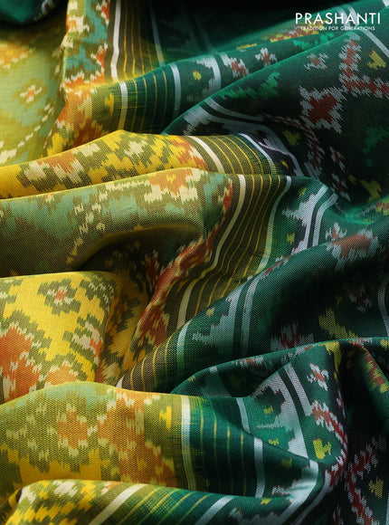 Rajkot patola silk saree mustard green and bottle green with allover ikat weaves and thread woven border