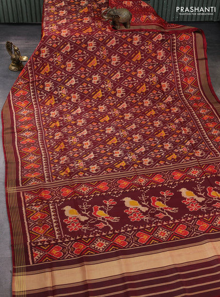 Rajkot patola silk saree maroon with allover ikat weaves and ikat woven simple border
