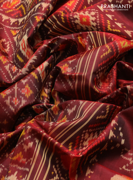 Rajkot patola silk saree maroon with allover ikat weaves and ikat woven simple border