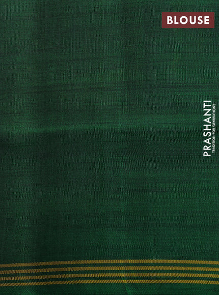 Rajkot patola silk saree yellow and green with allover ikat weaves and ikat woven simple border