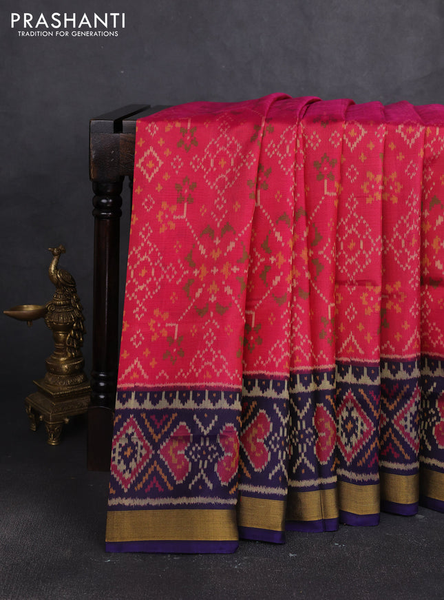 Rajkot patola silk saree peach pink and navy blue with allover ikat weaves and zari woven border