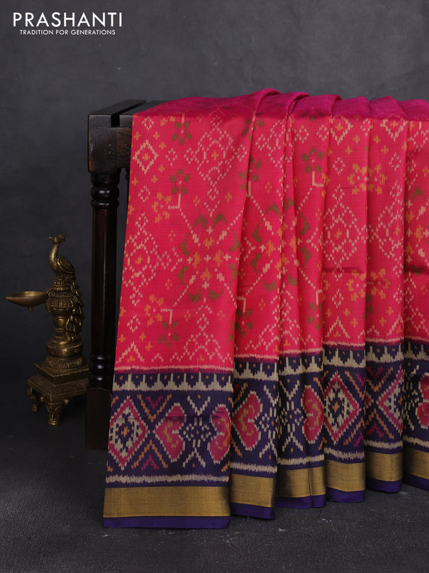 Rajkot patola silk saree peach pink and navy blue with allover ikat weaves and zari woven border