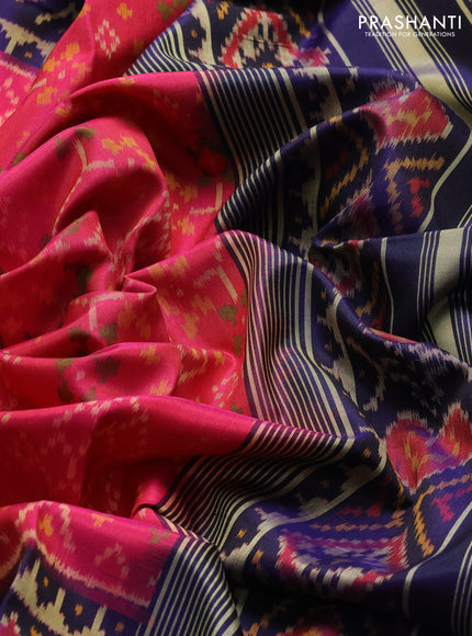 Rajkot patola silk saree peach pink and navy blue with allover ikat weaves and zari woven border