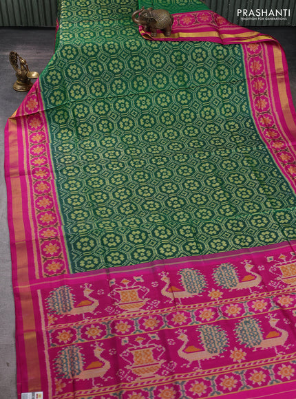 Rajkot patola silk saree green and pink with ikat woven buttas and zari woven border