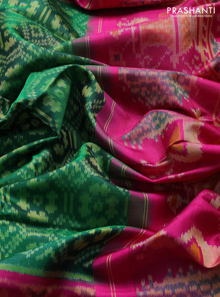 Rajkot patola silk saree green and pink with ikat woven buttas and zari woven border