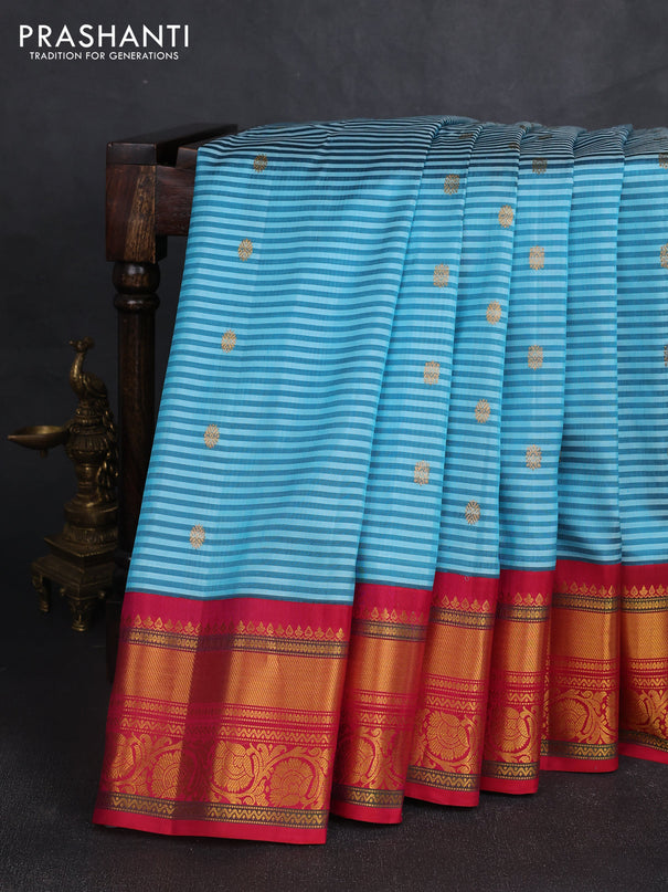 Pure gadwal silk saree teal blue and pink with allover stripe pattern & zari buttas and rich zari woven border