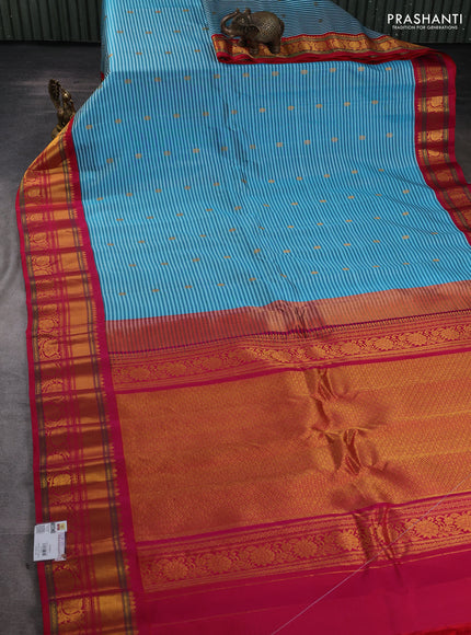 Pure gadwal silk saree teal blue and pink with allover stripe pattern & zari buttas and rich zari woven border