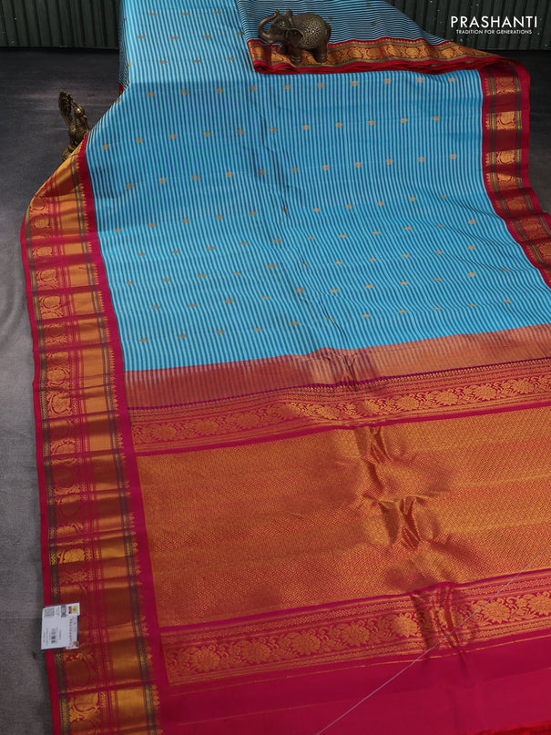Pure gadwal silk saree teal blue and pink with allover stripe pattern & zari buttas and rich zari woven border