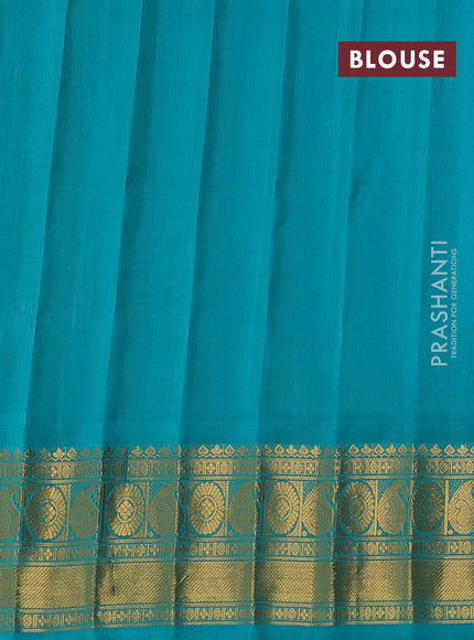 Pure gadwal silk saree cream and teal green with allover zari woven buttas and temple design zari woven border