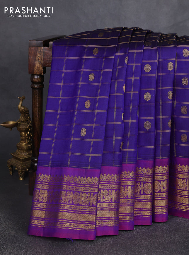Pure gadwal silk saree blue and magenta pink with allover zari checks & buttas and zari woven border