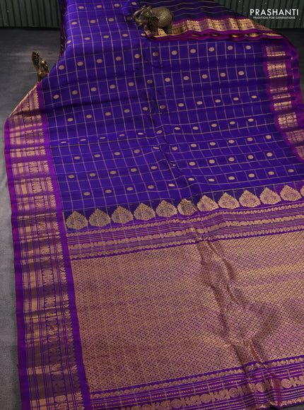 Pure gadwal silk saree blue and magenta pink with allover zari checks & buttas and zari woven border