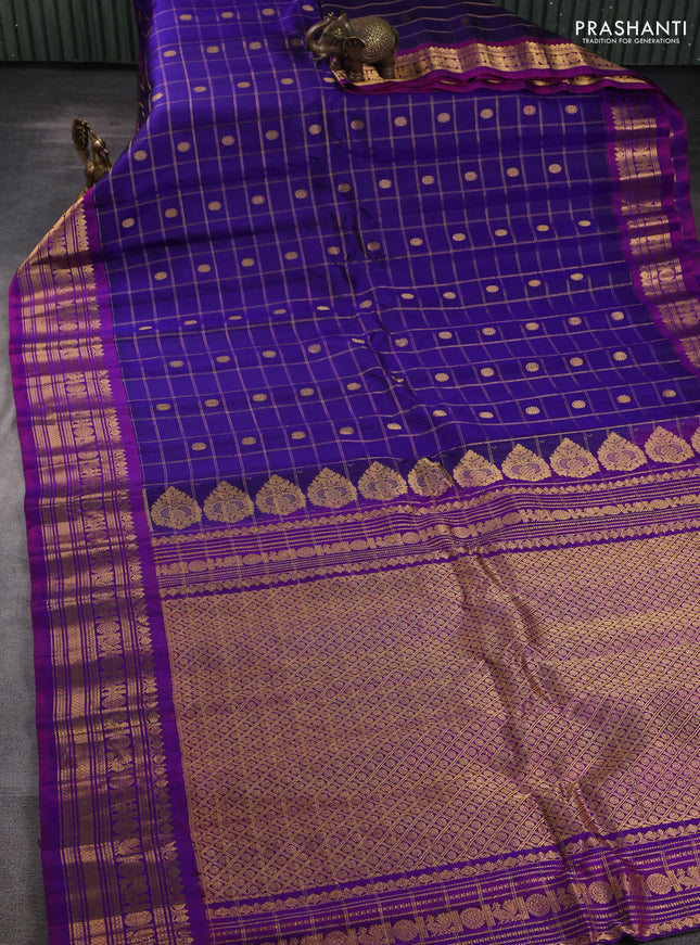 Pure gadwal silk saree blue and magenta pink with allover zari checks & buttas and zari woven border