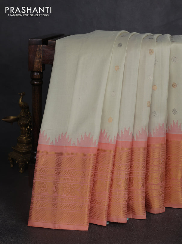 Pure gadwal silk saree cream and peach orange with silver & gold zari woven buttas and long temple design zari woven border