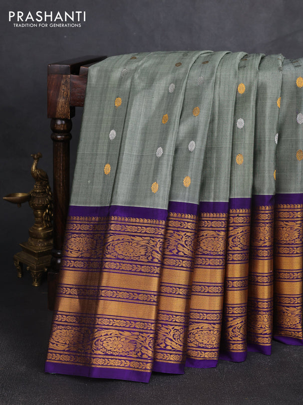 Pure gadwal silk saree greyish green and violet with silver & gold zari woven buttas and long zari woven border