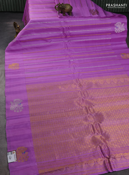 Pure gadwal silk saree lavender with allover zari weaves and peacock zari woven butta border