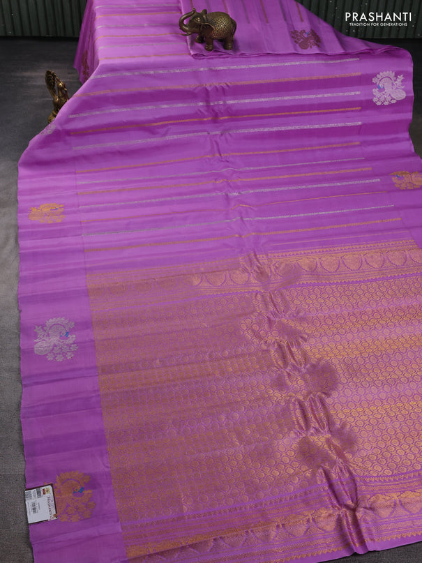 Pure gadwal silk saree lavender with allover zari weaves and peacock zari woven butta border