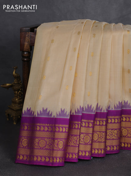 Pure gadwal silk saree cream and purple with zari woven buttas and temple design zari woven border