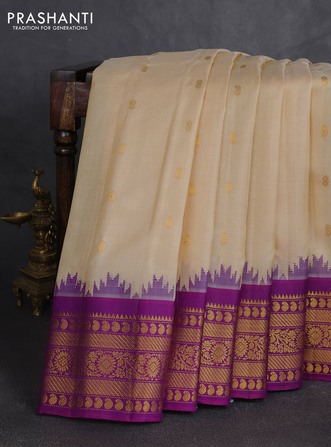 Pure gadwal silk saree cream and purple with zari woven buttas and temple design zari woven border
