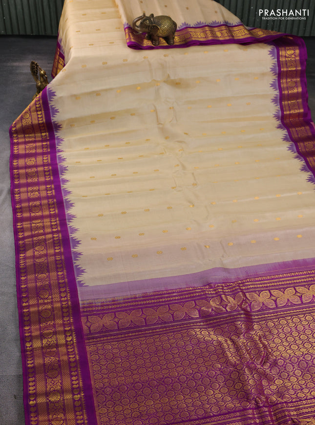 Pure gadwal silk saree cream and purple with zari woven buttas and temple design zari woven border
