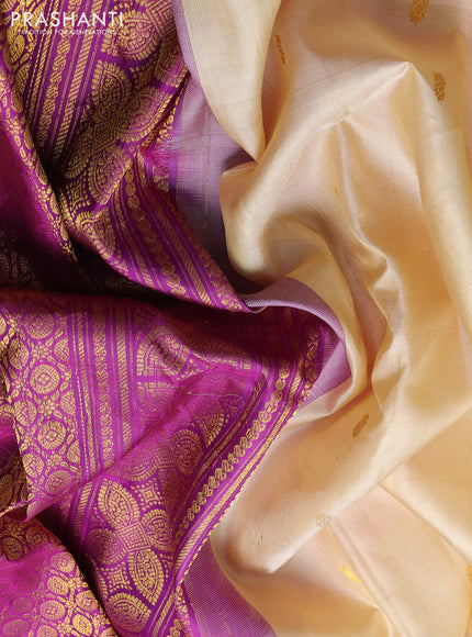 Pure gadwal silk saree cream and purple with zari woven buttas and temple design zari woven border