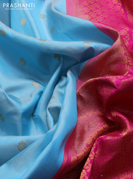 Pure gadwal silk saree light blue and magenta pink with zari woven buttas and temple design zari woven border