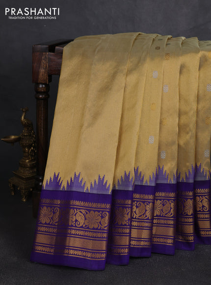 Pure gadwal tissue silk saree gold and violet with allover silver & gold zari woven buttas and temple design zari woven border