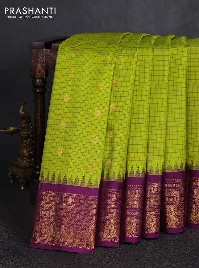 Pure gadwal silk saree lime green and purple with allover checks & zari woven buttas and temple design zari woven border