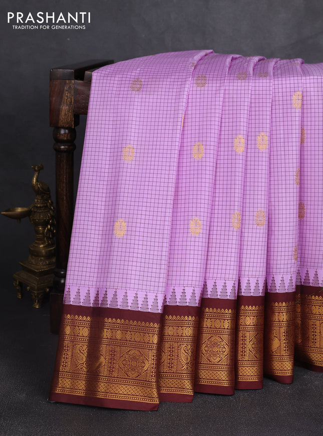Pure gadwal silk saree lavender and coffee brown with allover checks & zari woven buttas and temple design zari woven border