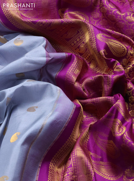 Pure gadwal silk saree grey and purple with allover zari woven buttas and temple design zari woven border